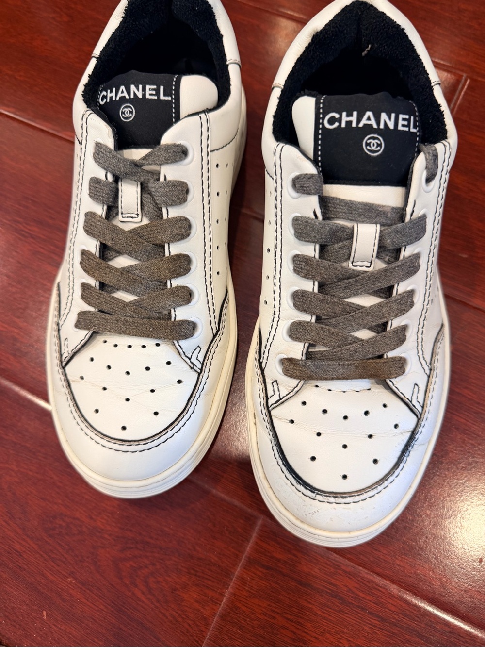 CHANEL women’s White Leather Low-Top Sneakers